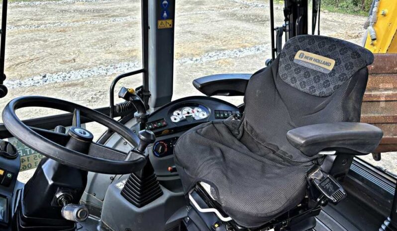 2017 New Holland Starrer Baggerlader B 115 C full