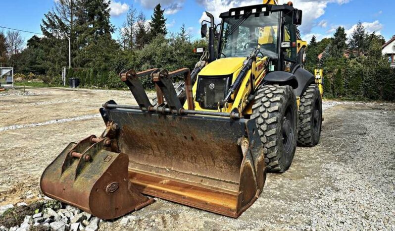 2017 New Holland Starrer Baggerlader B 115 C full